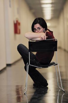 young casual woman relax indoor in big bright hold