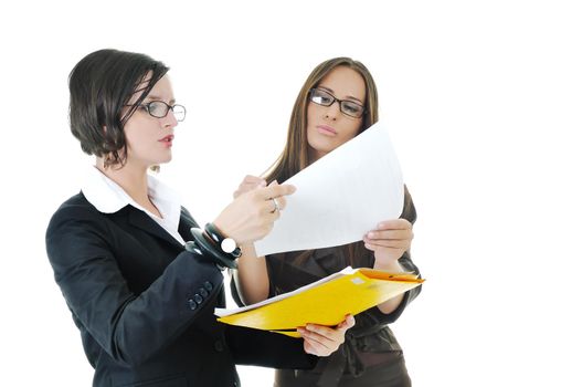 two young business woman group looking documents and giving advice and consultation