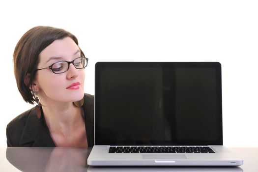 one young business woman isolated on white working on laptop computer