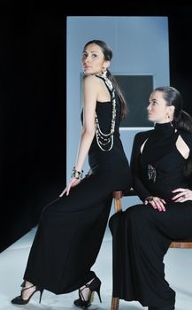 beautiful woman on fashion show piste with gold jawel