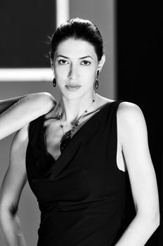 beautiful woman on fashion show piste with gold jawel