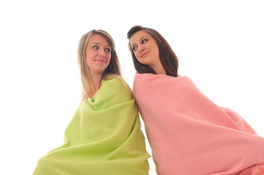 two youg happy giril woman smiling unger blanket isolated representing concept of lesbian love, happynes and softnes