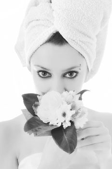 beauty halth and spa wellness isolated young woman face portrait closeup with towel and flower treatment