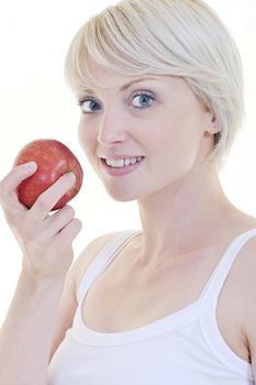 happy young woman eat green apple isolated  on white backround in studio