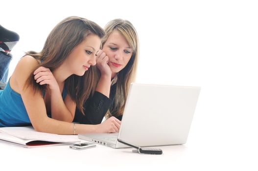 successful team two young happy  student girl work on laptop computer isolated on white