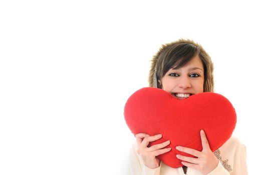happy young woman with heart isolated on white