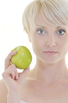 happy young woman eat green apple isolated  on white backround in studio