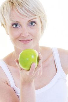 happy young woman eat green apple isolated  on white backround in studio