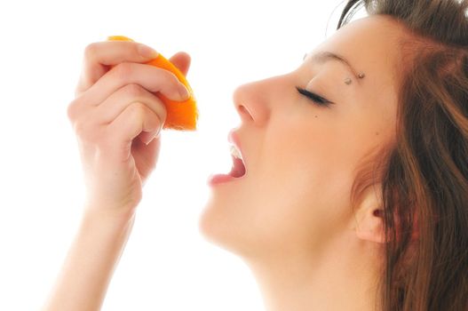 young woman orange isolated fruit food