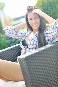 beautiful young woman lady posing in green moden outdoor garden