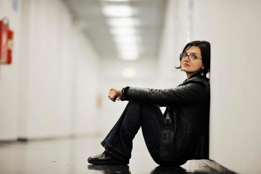 young casual woman relax indoor in big bright hold
