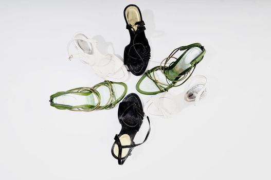 many woman shoes isolated on white  representing fashion diversity concept