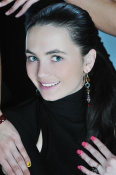 beautiful woman on fashion show piste with gold jawel