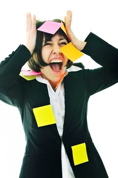 one frustrated young business woman with many of post it representing concept memory and frustration on work