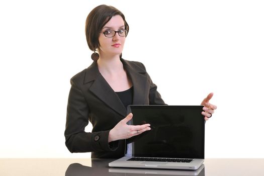 one young business woman isolated on white working on laptop computer