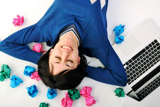 young beautiful brunette student woman working on laptop computer and finding solutions