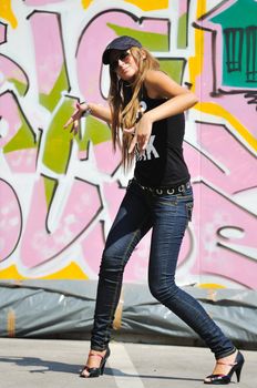 young pretty urban modern fashion woman pose outdoor on street