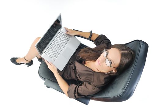 young beautiful business woman isolated on white workling on laptop computer