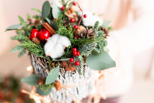 Christmas decoration with carnations, chrysanthemums santini, brunia and fir. Christmas spirit and mood