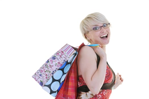 women shopping concept with young lady and colored bags  isolated over white background in studio