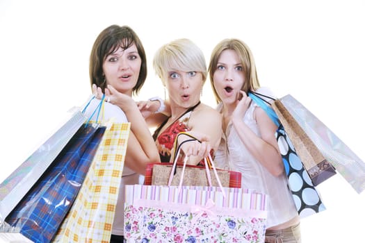 happy young adult women  shopping with colored bags  isolated over white background in studio