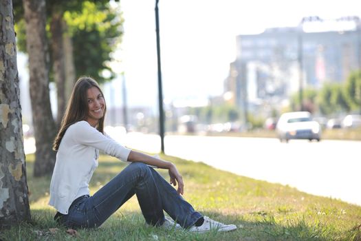 beautiful young woman have fun and relax at city street on beautiful sunny day