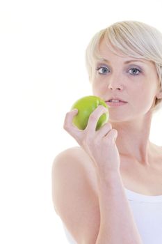 happy young woman eat green apple isolated  on white backround in studio