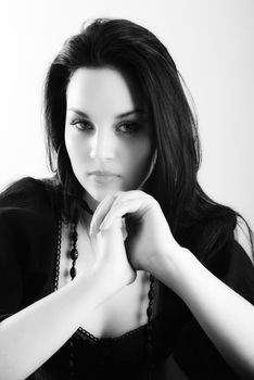 one brunette woman posing in studio 