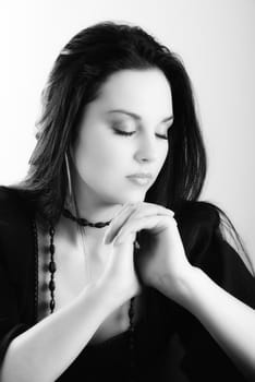 one brunette woman posing in studio 