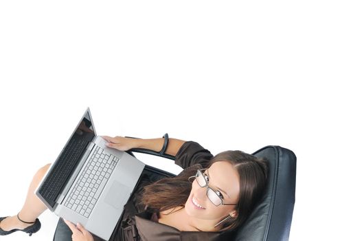 young beautiful business woman isolated on white workling on laptop computer