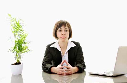 one young business woman isolated on white working on laptop computer