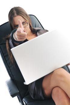 young beautiful business woman isolated on white workling on laptop computer