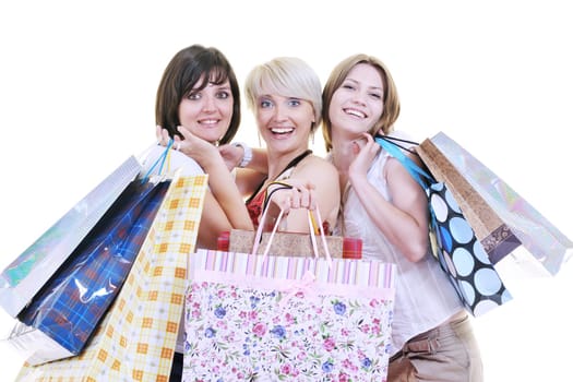 happy young adult women  shopping with colored bags  isolated over white background in studio