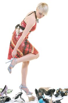 woman buy shoes concept of choice and shopping, isolated on white background in studio