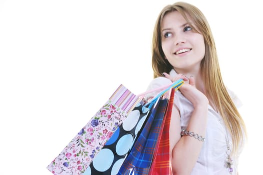 happy young adult women  shopping with colored bags  isolated over white background in studio