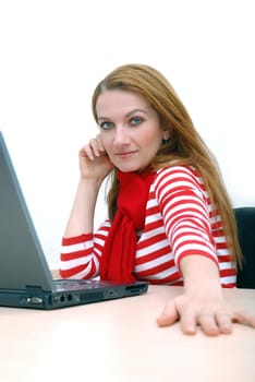 woman in red working on laptop at bright  office