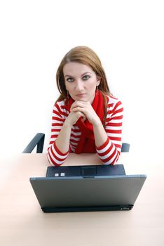 woman in red working on laptop at bright  office