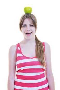 happy young woman eat green apple isolated  on white backround in studio