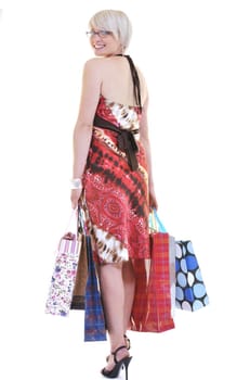 happy young adult women  shopping with colored bags  isolated over white background in studio