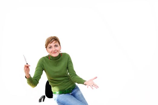 businesswoman in green working on laptop