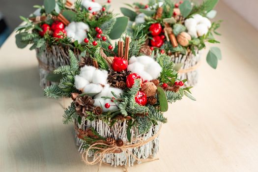 Christmas decoration with carnations, chrysanthemums santini, brunia and fir. Christmas spirit and mood