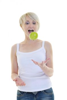 happy young woman eat green apple isolated  on white backround in studio