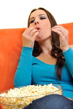 young woman eat popcorn, watching movies and eat popcorn at modern home living room  isolated on white background