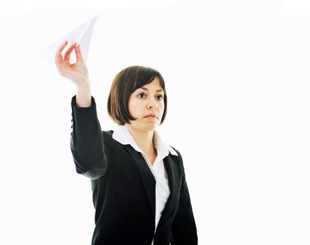happy young business woman isolated ona white throwing paper airplane 