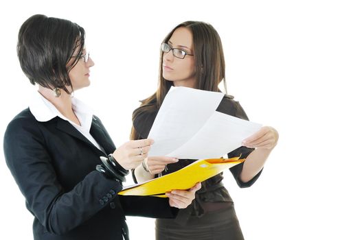 two young business woman group looking documents and giving advice and consultation