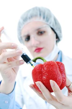 isolated on white young nurse doctor woman with red vegetable food papper representing bio food concept 
