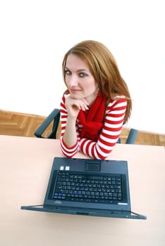 woman in red working on laptop at bright  office