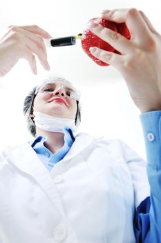 isolated on white young nurse doctor woman with red vegetable food papper representing bio food concept 