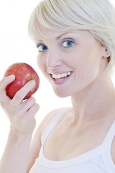 happy young woman eat green apple isolated  on white backround in studio