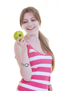 happy young woman eat green apple isolated  on white backround in studio